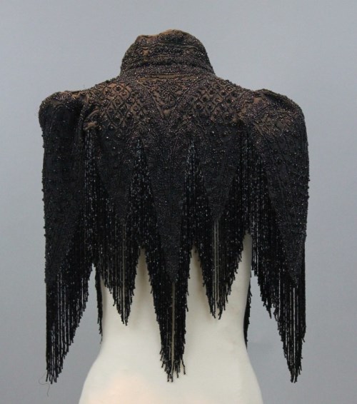 a black silk, beaded fichu