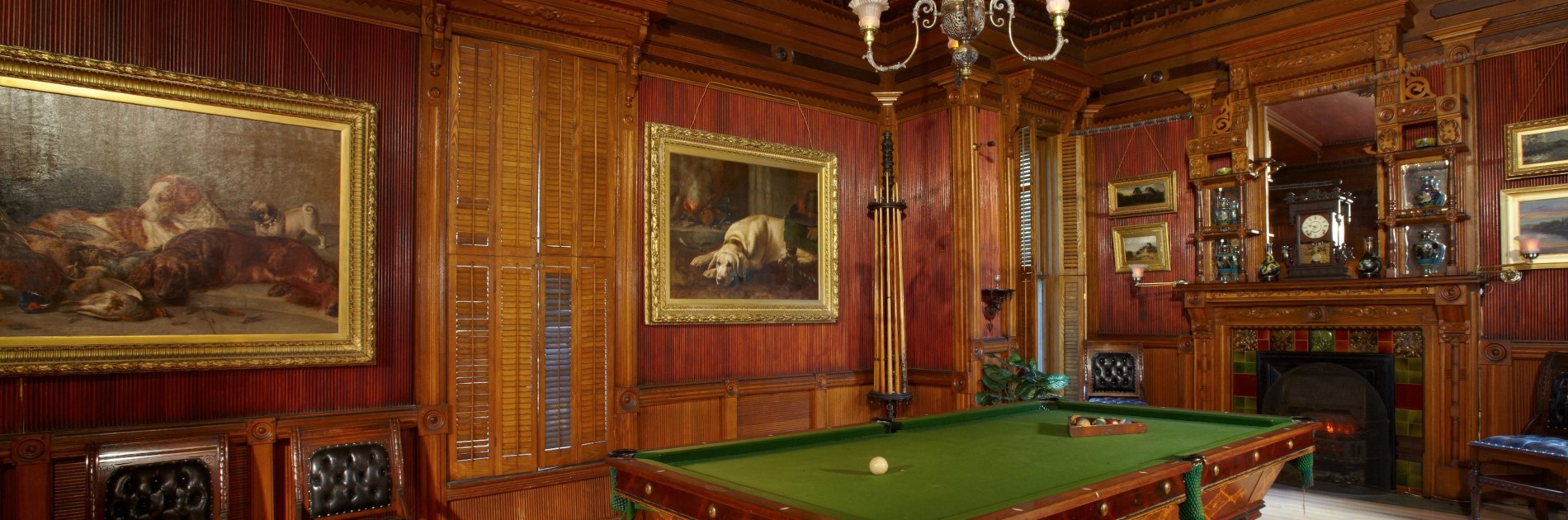 Billiard Room paintings of golden lab and hunting dogs