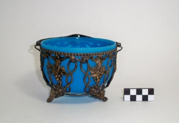 Blue milk glass bowl in electroplated silver filigree basket with handle