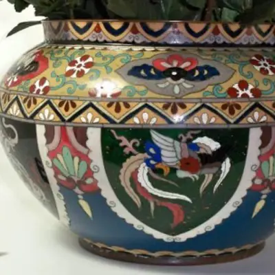  A blue cloisonné jardiniere, decorative planter, with intricate designs.