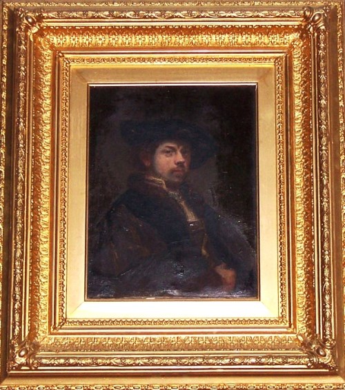 Oil painting copy of a self portrait of Rembrandt within a gold frame. Copy is attributed to Bertram Couldery.