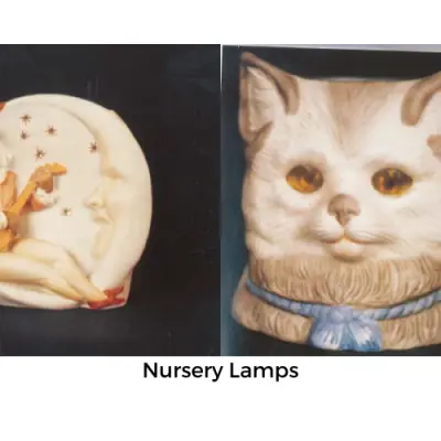 two small nursery lamps, one featuring the face of a cat and the other showing a minstrel playing an instrument and the moon